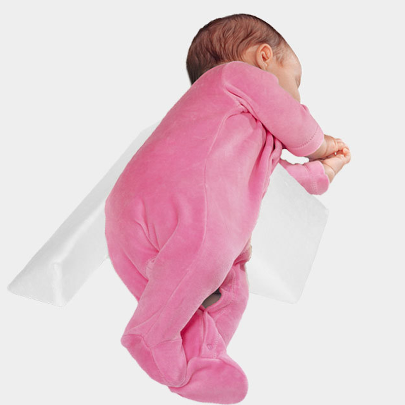 Slaapkussen aan babyzijde