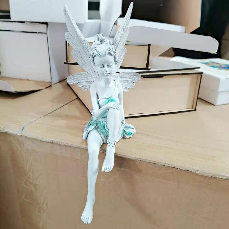 Zittend Feeëntuinbeeld