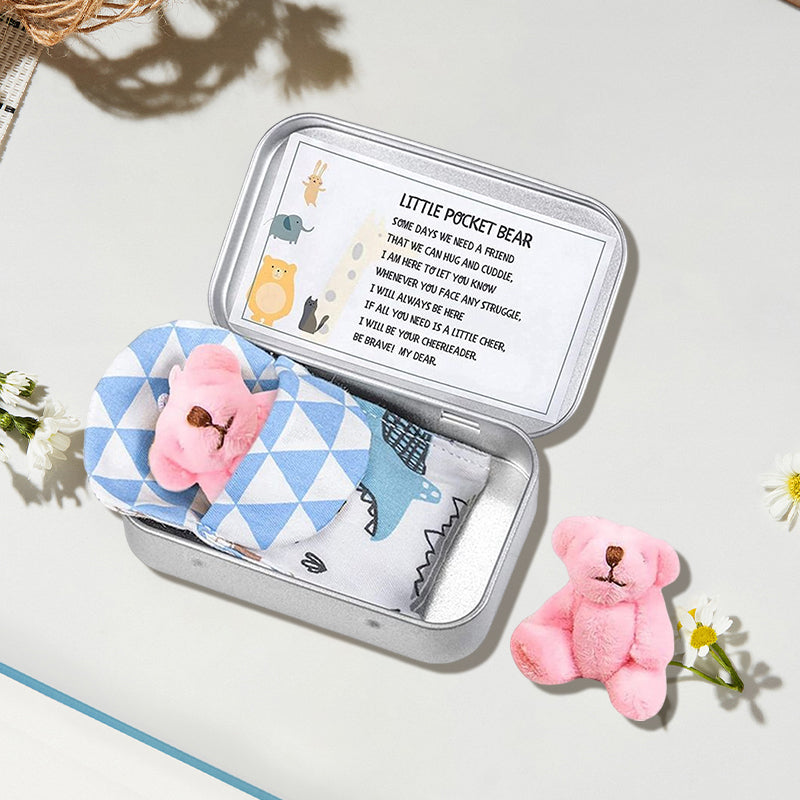 Teddybeer in een blikken doos