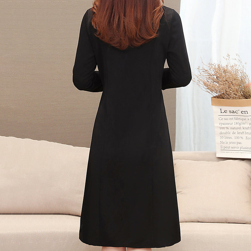 TWEEDELIGE JURK MET TEMPERAMENT