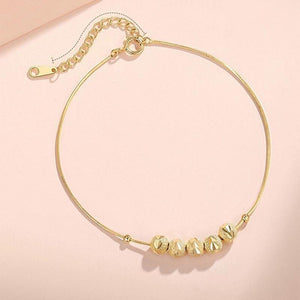 Overdracht kralen ketting en armband