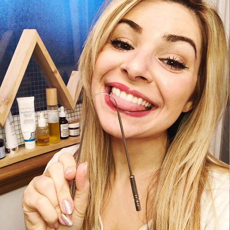 Draagbare tongschraper