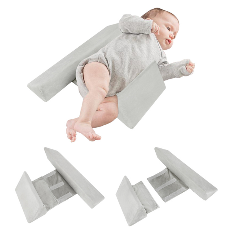 Slaapkussen aan babyzijde