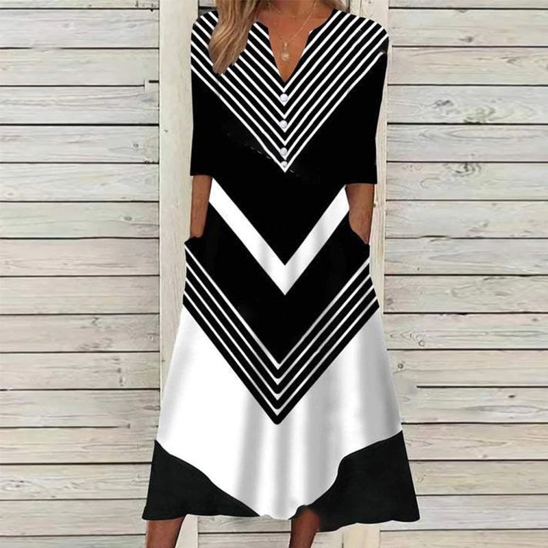 Zwart-witte midi-jurk met matrozen streep en zijzakken