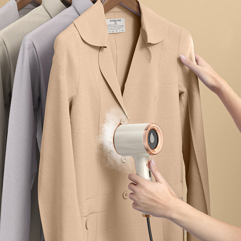 Draagbare mini-strijkmachine