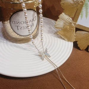Verstelbare ketting met vlinderparel