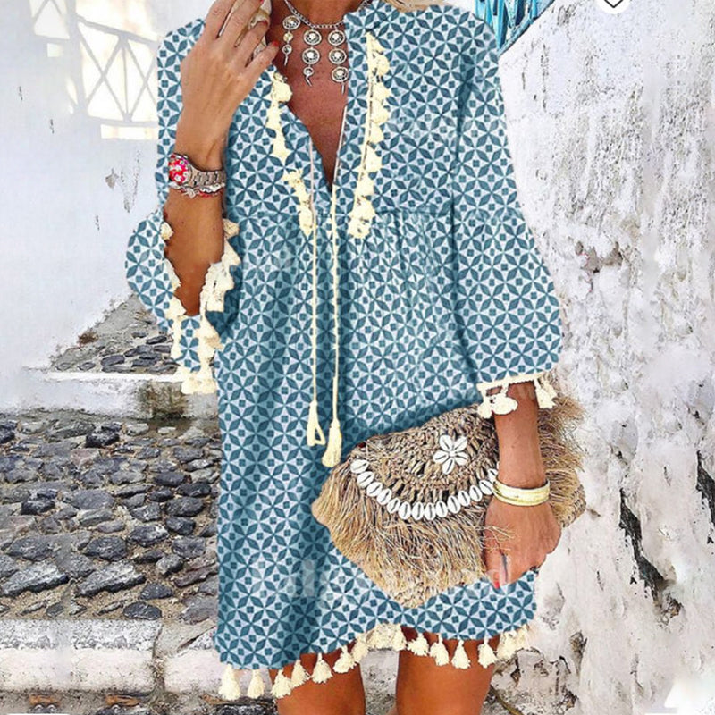 Producten Jurk met V-hals en franjes met ruches