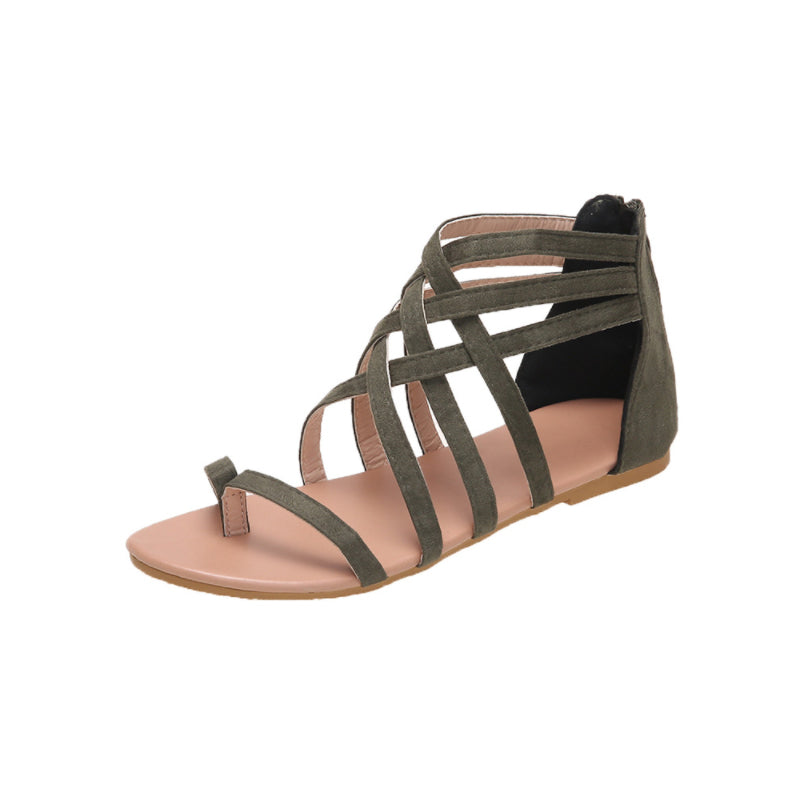 Platte zomersandalen met gekruiste bandjes en rits