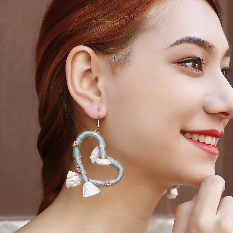 Hart met de hand geweven oorbellen