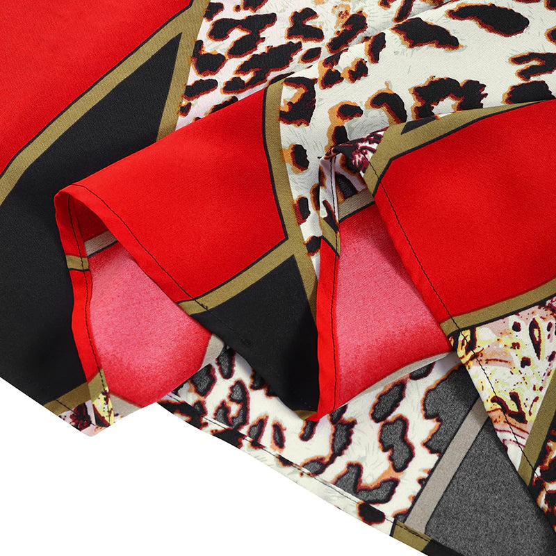 Grote maat bedrukte v-hals losse jurk met lange mouwen