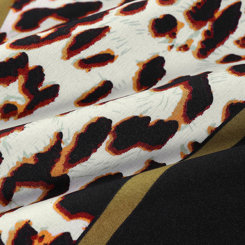 Grote maat bedrukte v-hals losse jurk met lange mouwen