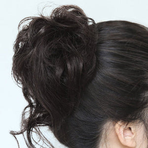 Rommelige knot haarstukjes
