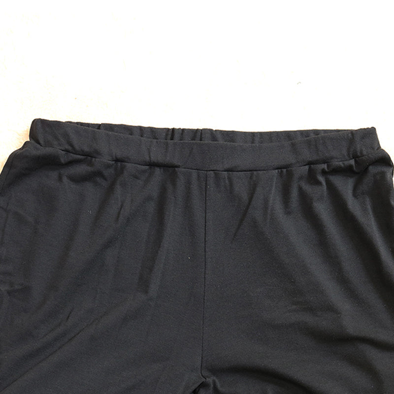 Grote maat top en short met ruches aan zoom en effen kleur