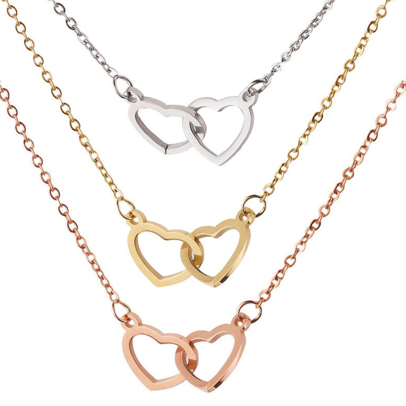 Ketting met twee harten en een roterende rozengeschenkdoos