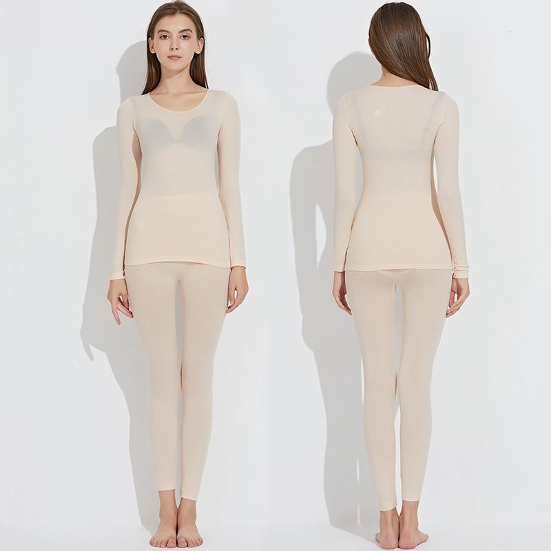 Naadloze elastische thermische binnenkleding